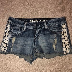 Jean shorts with lace flower trim